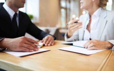 Business people discussing contract